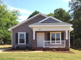Homes. Now don't you feel like volunteering one weekend so that someone can have a damned roof over their head? Follow this link: www.habitat.org/cd/giving/land