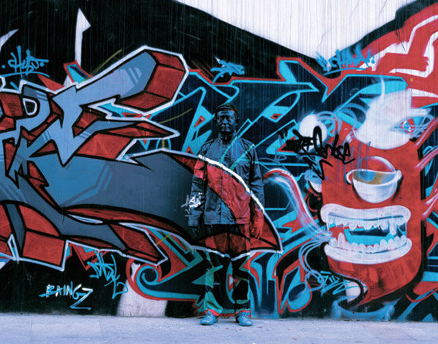 Ladies and Gentlemen...Liu Bolin. Took me like 5 min to see where he was Chinese artist Liu Bolin camouflages himself into any surroundings with paint! It can t