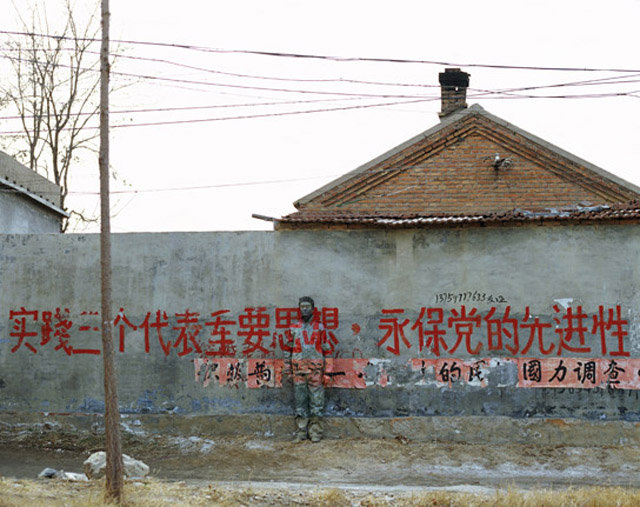 Ladies and Gentlemen...Liu Bolin. Took me like 5 min to see where he was Chinese artist Liu Bolin camouflages himself into any surroundings with paint! It can t