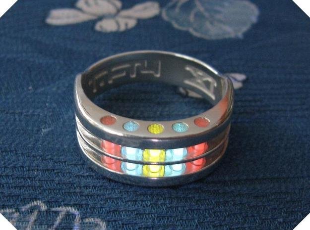 Tritium Jewelry. Tritium tubes are simply gas-filled, thin glass vials with inner surfaces coated with a phosphor. The gaseous tritium in these light sources un